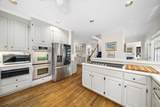 9100 Huntcliff Trace - Photo 13