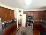 6640 Grand Magnolia Drive - Photo 12