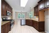7020 Weybridge Drive - Photo 16