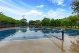 9995 Huntcliff Trace - Photo 31