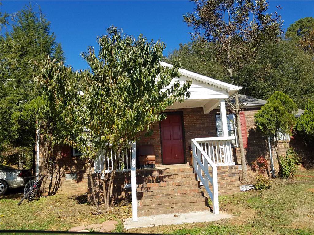 8395 Cumming Highway - Photo 1 8395 Cumming Highway - Photo 1