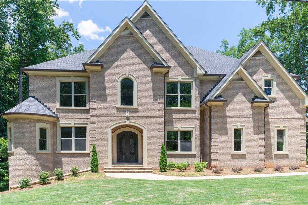 9215 Huntcliff Trace - Photo 1
