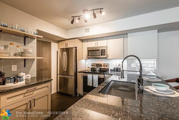 7933 Venture Center Way - Photo 1