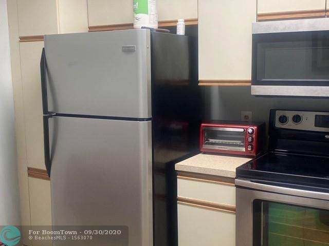 8955 Wiles Rd - Photo 1