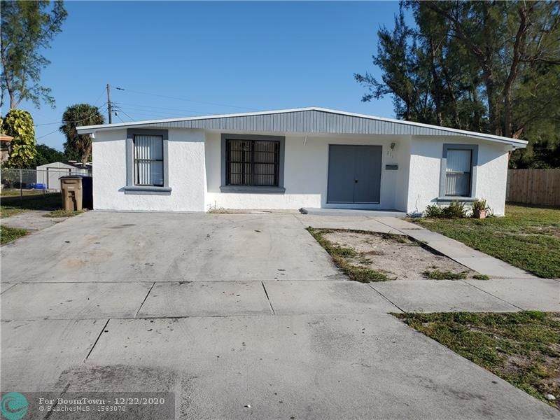 211 42nd St - Photo 1