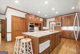 9335 Huntcliff Trace - Photo 24