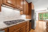 9335 Huntcliff Trace - Photo 25