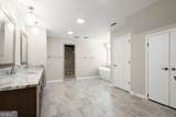 9335 Huntcliff Trace - Photo 48