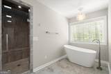 9335 Huntcliff Trace - Photo 49