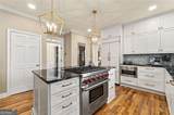 9570 Huntcliff Trace - Photo 11
