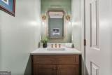 9570 Huntcliff Trace - Photo 21