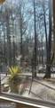 9570 Huntcliff Trace - Photo 45