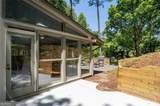 9570 Huntcliff Trace - Photo 49