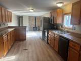 2495 9TH AVE NE - Photo 5