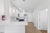 321 E 3Rd St - Photo 18
