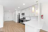 321 E 3Rd St - Photo 20