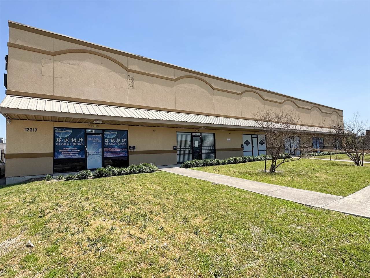 12317 Bellaire Boulevard - Photo 1