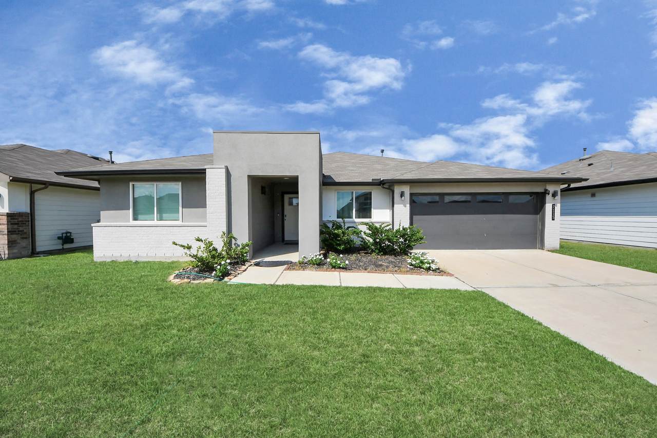 7115 Whispering Leaf Street - Photo 1