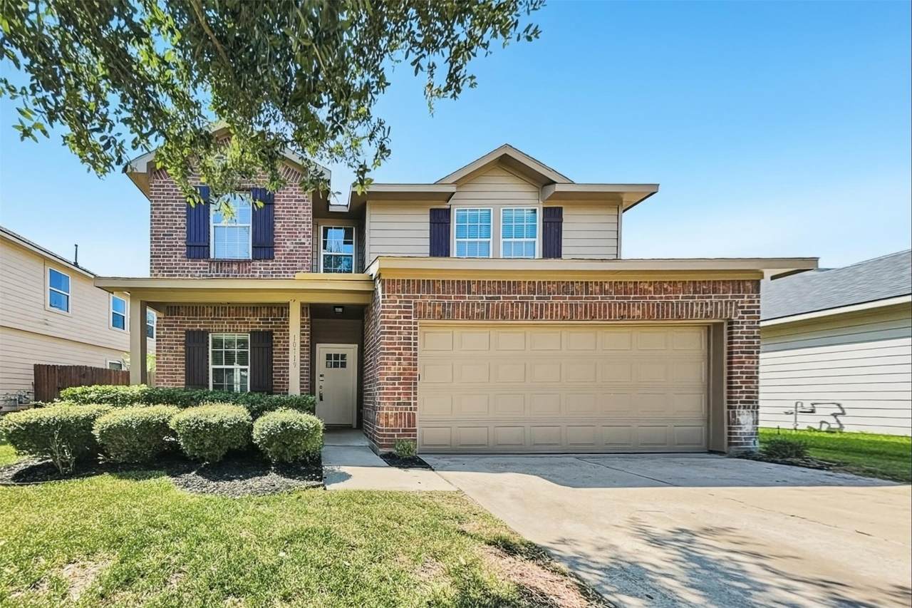 10719 Woodwind Shadows Drive - Photo 1