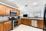 13927 Tribe Drive - Photo 9