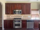 8303 Kerrington Glen Drive - Photo 7