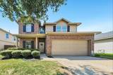 10719 Woodwind Shadows Drive - Photo 1
