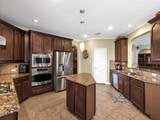 8310 Crescent Knolls Drive - Photo 13