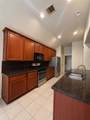 8726 Rollick Drive - Photo 12