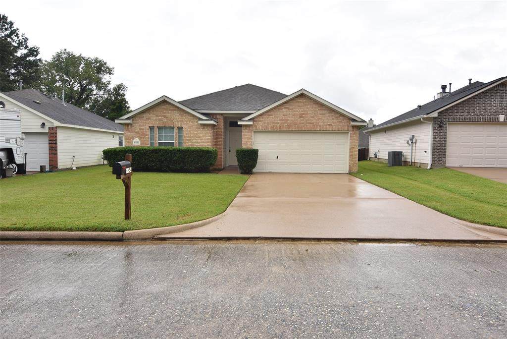 6954 Breezy Point Point - Photo 1