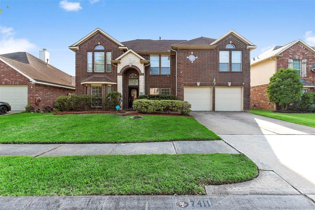 7411 Cypress Bluff Drive - Photo 1