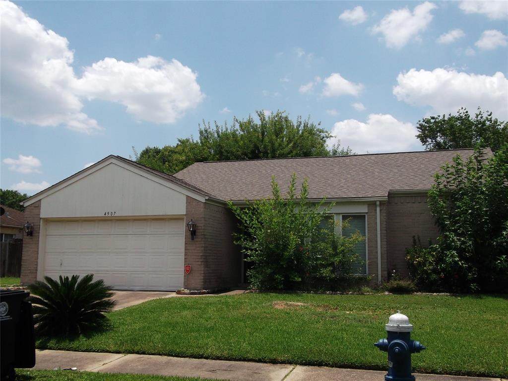 4907 Tenderwood Drive - Photo 1
