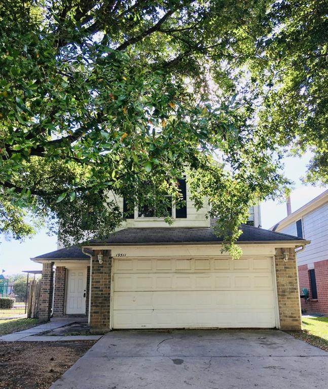 19511 Sandy Woods Drive - Photo 1 19511 Sandy Woods Drive - Photo 1