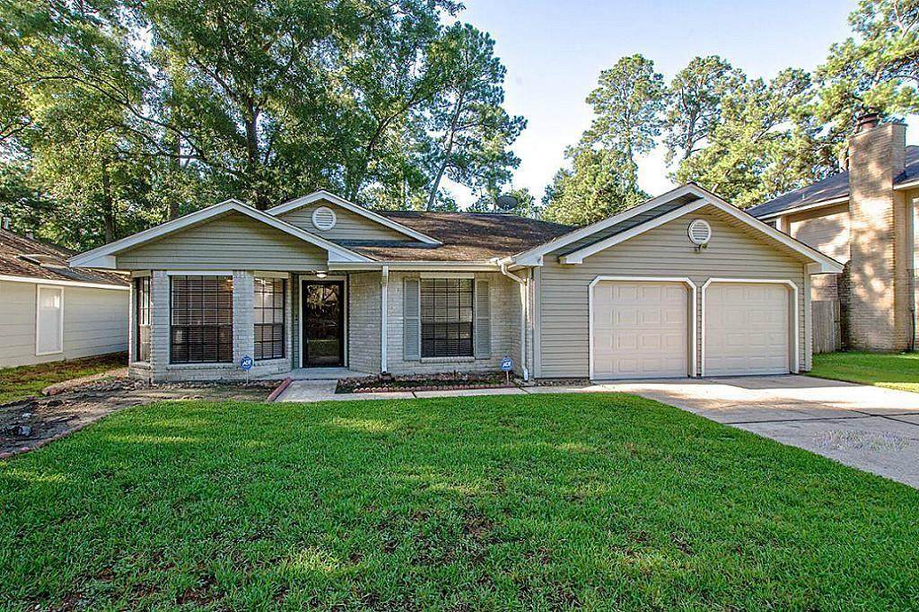 4911 Creek Shadows Drive - Photo 1