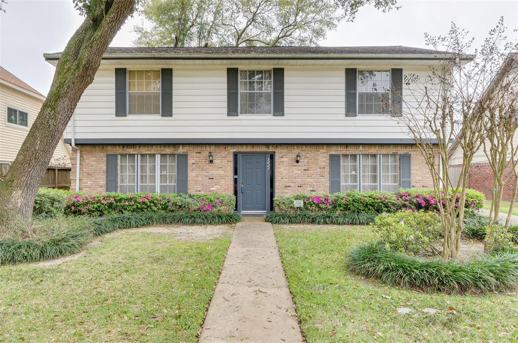 5027 Oak Shadows Drive - Photo 1