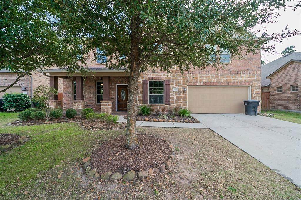 22722 Whispering Timbers Way - Photo 1