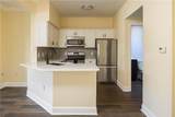 11603 Tomahawk Creek Parkway - Photo 5