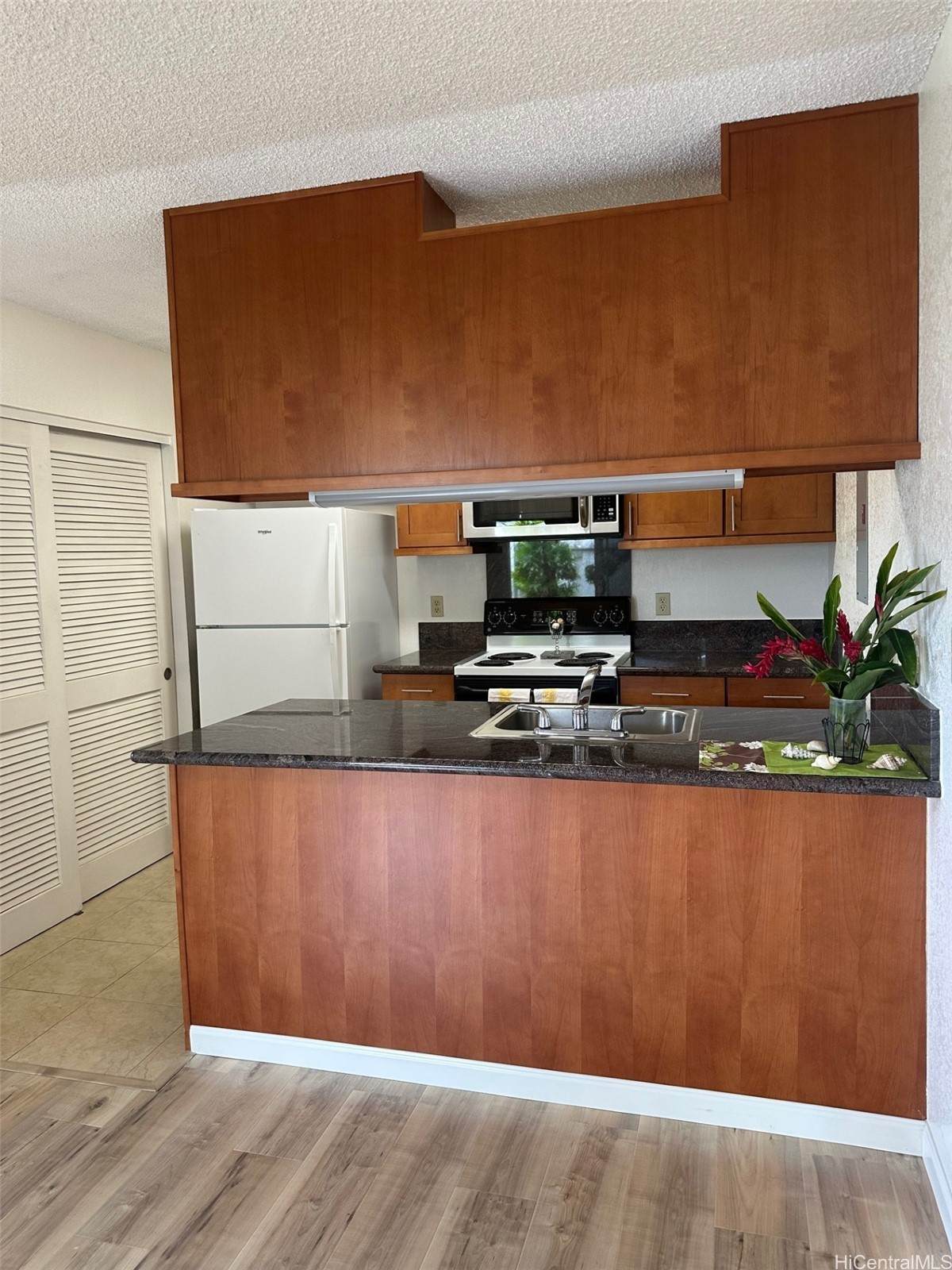 https://bt-photos.global.ssl.fastly.net/honolulu/1280_boomver_2_202605335-2.jpg