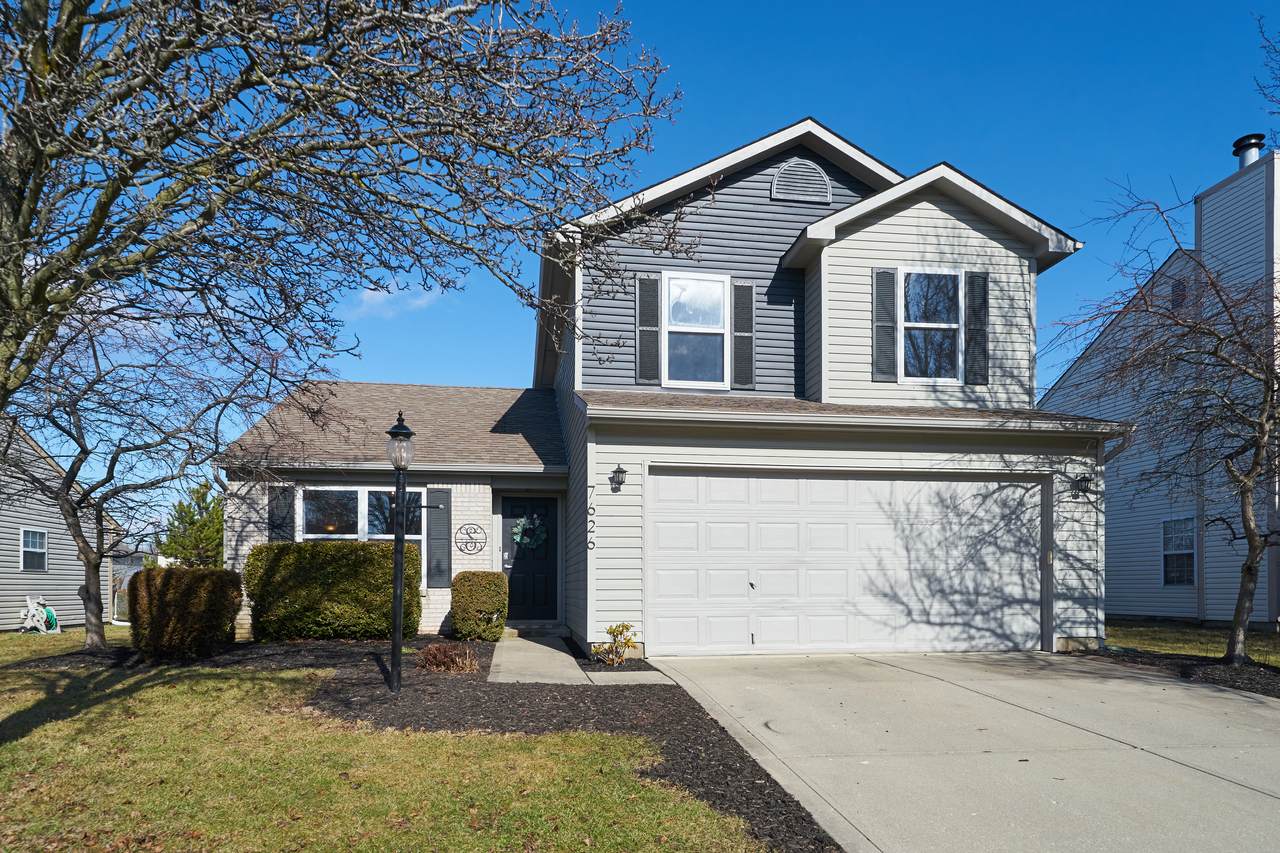 7626 Scatter Woods Lane - Photo 1
