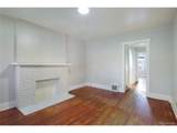 1253 Ogden St - Photo 3