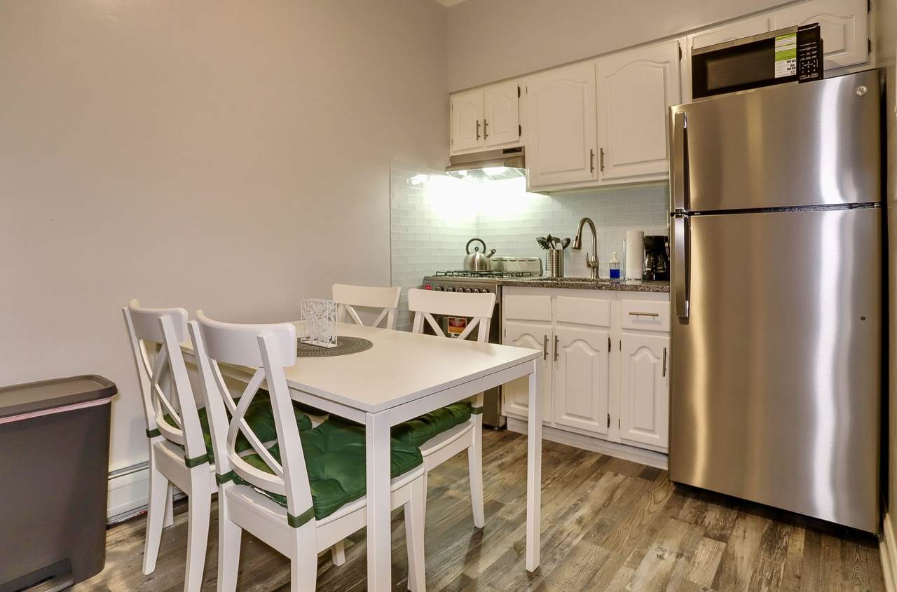 208 48TH ST - Photo 1
