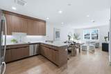 8404 4TH AVE - Photo 2