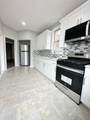 8609 2ND AVE - Photo 4
