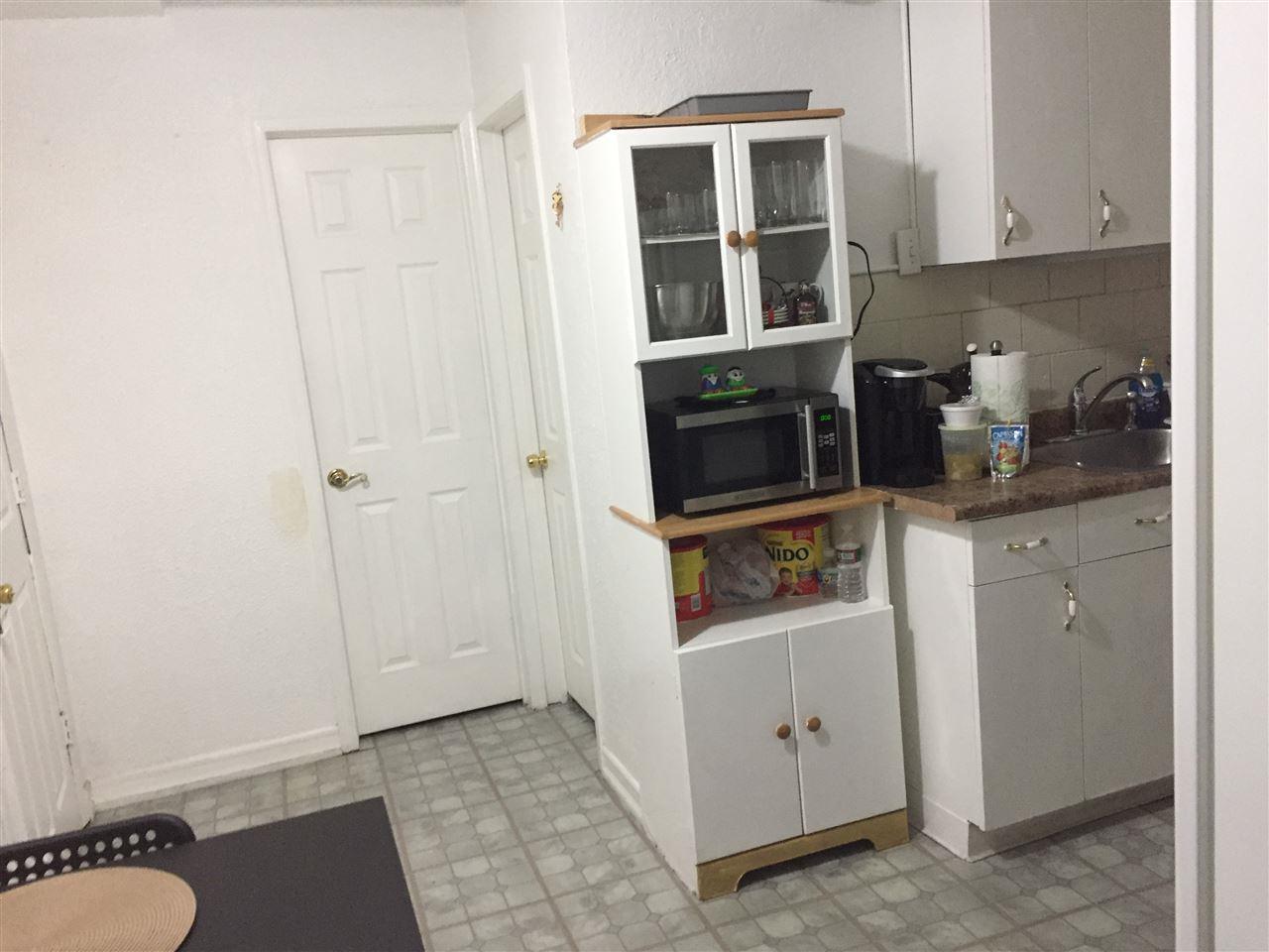 213 48TH ST - Photo 1