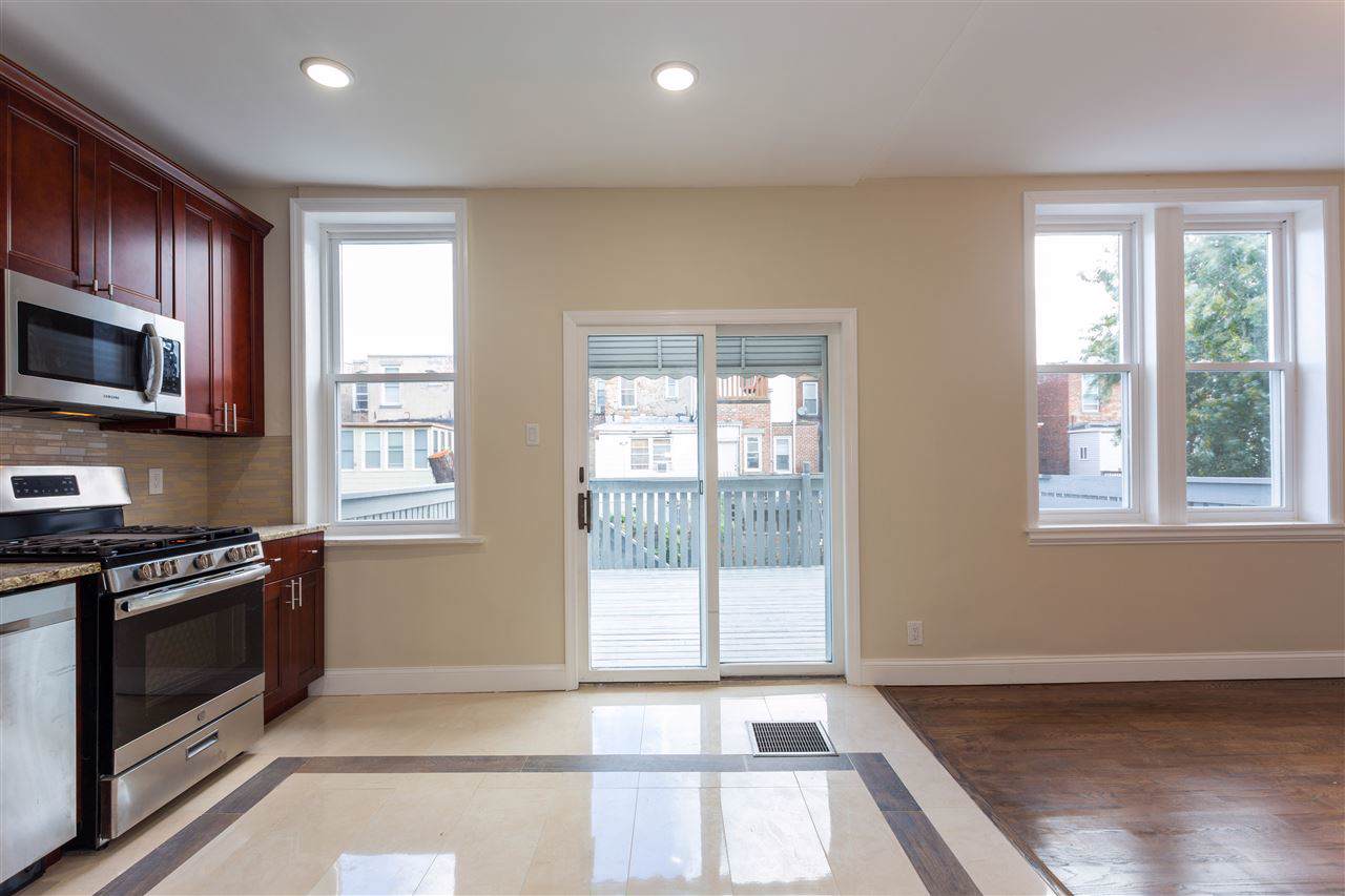 410 56TH ST - Photo 1