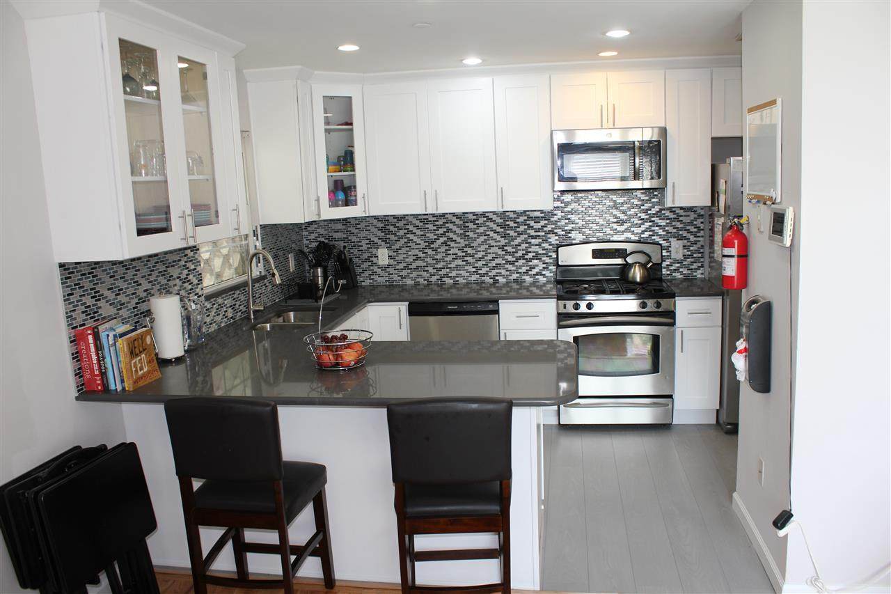 208 67TH ST - Photo 1