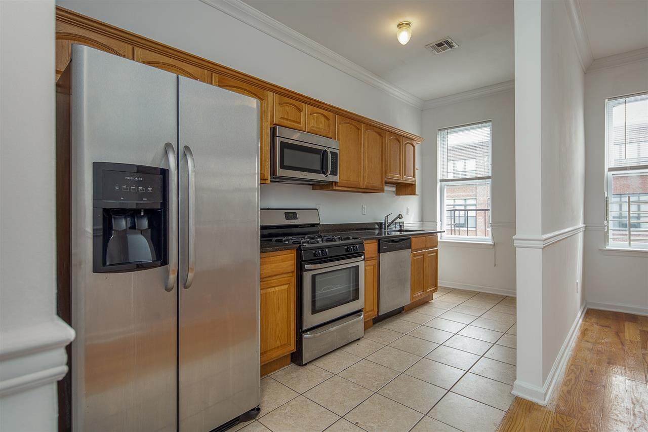293 Communipaw Ave - Photo 1