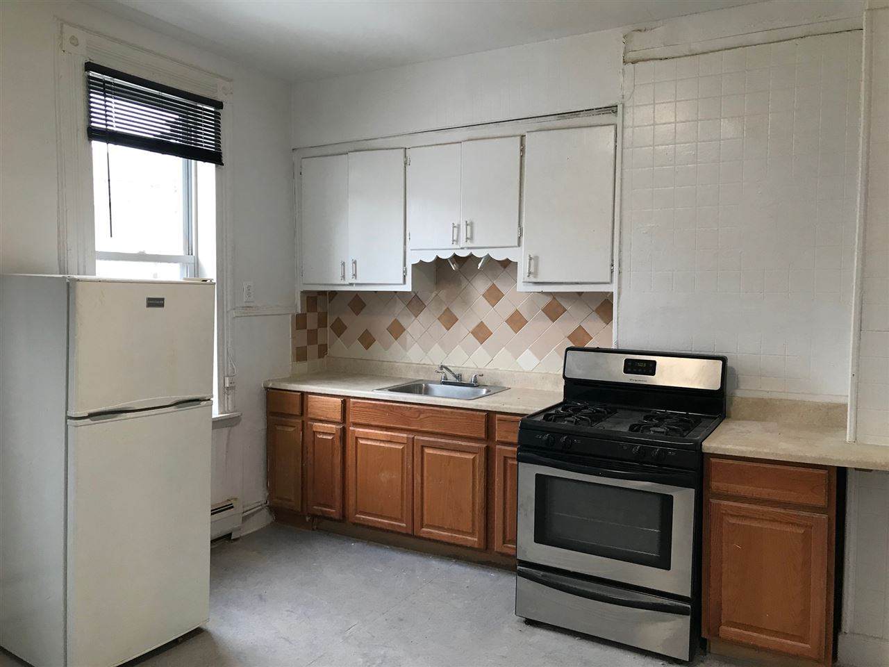 718 Grand St - Photo 1