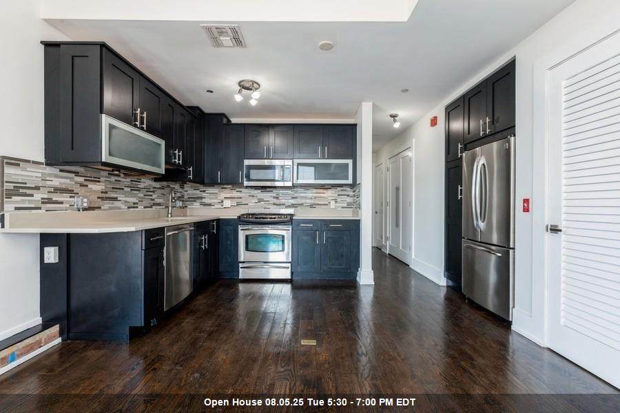 704 Grand St - Photo 1