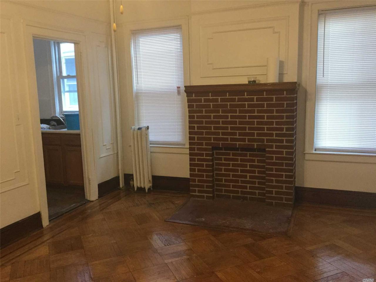 57-27 69th Pl - Photo 1