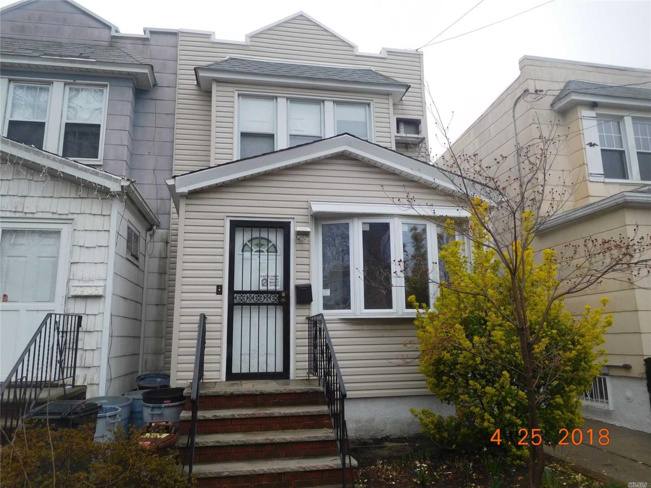 69-04 69th St - Photo 1